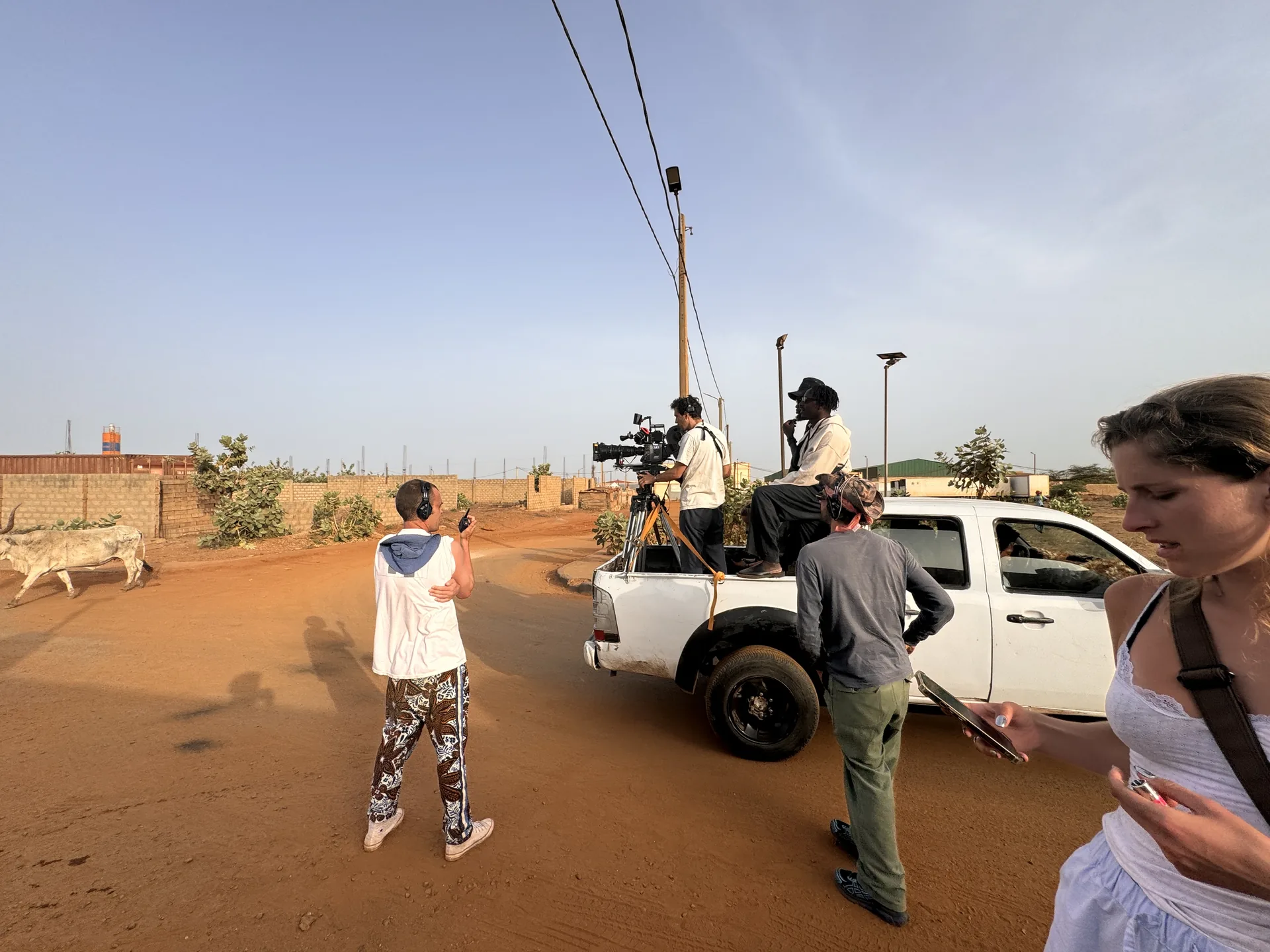 Adidas BTS crew on truck dirt road Dakar